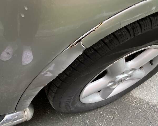 Сірий Ніссан ІксТрейл, об'ємом двигуна 2.5 л та пробігом 200 тис. км за 5400 $, фото 6 на Automoto.ua