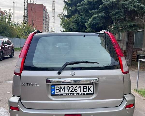 Серый Ниссан ИксТрейл, объемом двигателя 2 л и пробегом 262 тыс. км за 7079 $, фото 15 на Automoto.ua