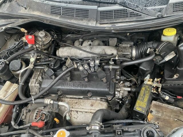 Серый Ниссан ИксТрейл, объемом двигателя 2 л и пробегом 280 тыс. км за 3500 $, фото 5 на Automoto.ua