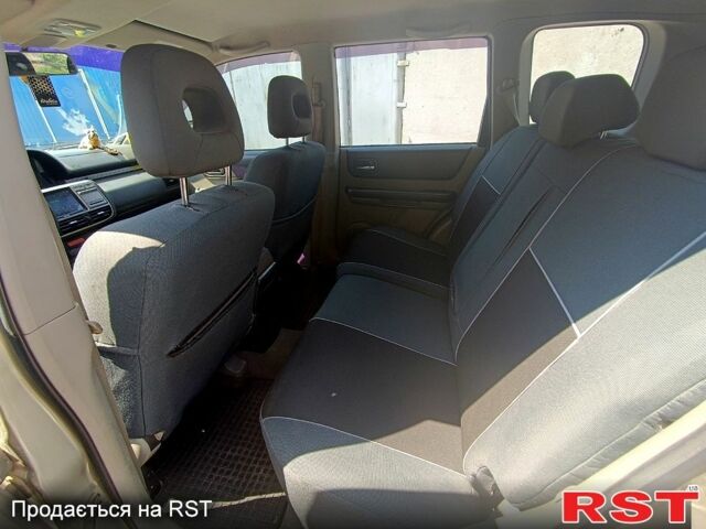 Серый Ниссан ИксТрейл, объемом двигателя 2 л и пробегом 275 тыс. км за 6300 $, фото 9 на Automoto.ua