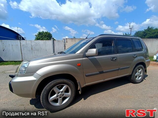 Серый Ниссан ИксТрейл, объемом двигателя 2 л и пробегом 275 тыс. км за 6300 $, фото 4 на Automoto.ua