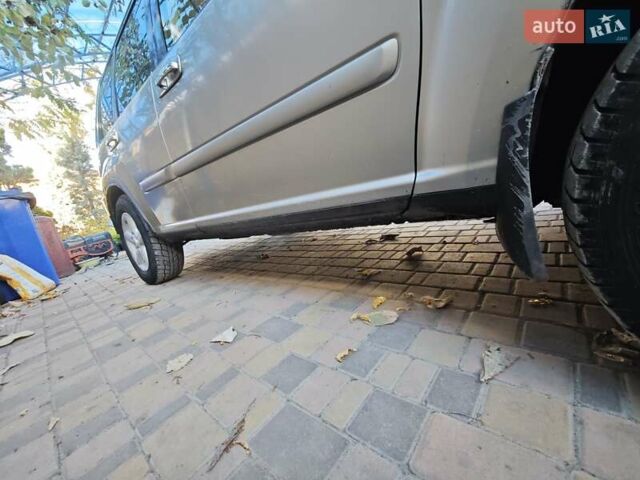 Сірий Ніссан ІксТрейл, об'ємом двигуна 2 л та пробігом 320 тис. км за 5500 $, фото 17 на Automoto.ua