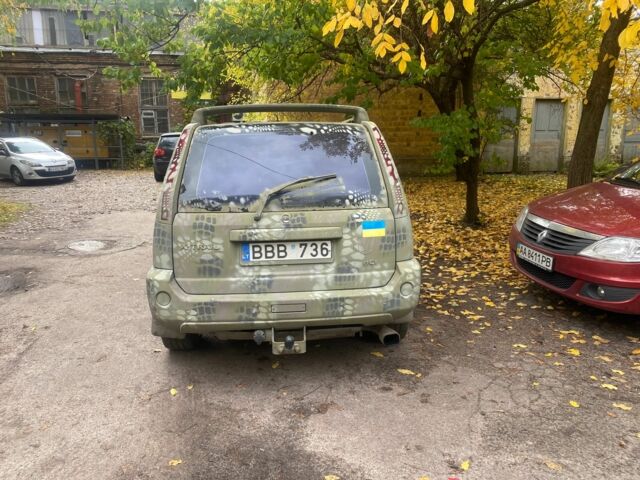 Серый Ниссан ИксТрейл, объемом двигателя 2.2 л и пробегом 383 тыс. км за 4000 $, фото 2 на Automoto.ua