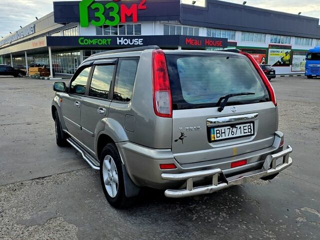 Серый Ниссан ИксТрейл, объемом двигателя 2 л и пробегом 220 тыс. км за 5800 $, фото 11 на Automoto.ua