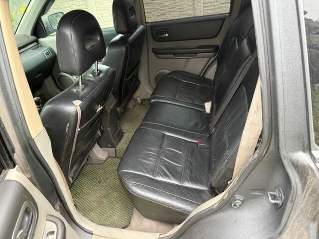 Серый Ниссан ИксТрейл, объемом двигателя 2.2 л и пробегом 290 тыс. км за 4000 $, фото 3 на Automoto.ua