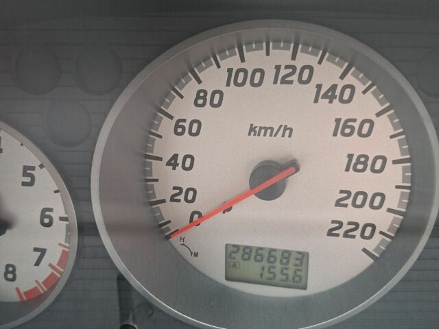 Серый Ниссан ИксТрейл, объемом двигателя 2.5 л и пробегом 286 тыс. км за 5800 $, фото 3 на Automoto.ua