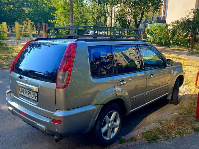 Сірий Ніссан ІксТрейл, об'ємом двигуна 2 л та пробігом 305 тис. км за 5200 $, фото 5 на Automoto.ua
