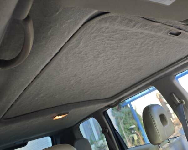 Сірий Ніссан ІксТрейл, об'ємом двигуна 2 л та пробігом 320 тис. км за 5500 $, фото 21 на Automoto.ua