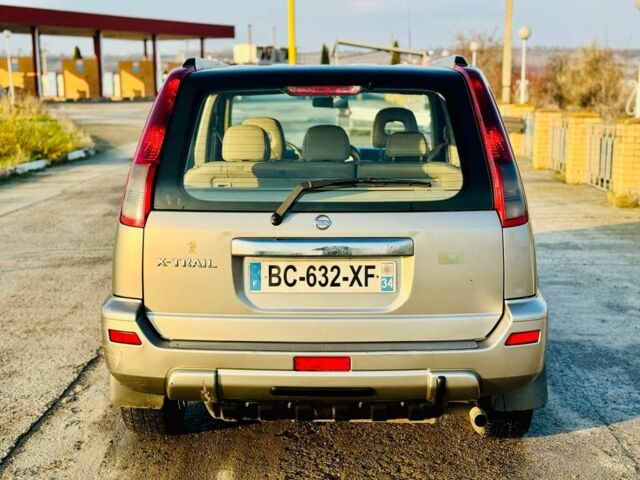 Серый Ниссан ИксТрейл, объемом двигателя 2.2 л и пробегом 280 тыс. км за 3750 $, фото 5 на Automoto.ua