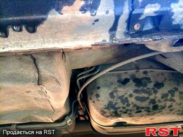 Сірий Ніссан ІксТрейл, об'ємом двигуна 2.5 л та пробігом 240 тис. км за 5800 $, фото 11 на Automoto.ua