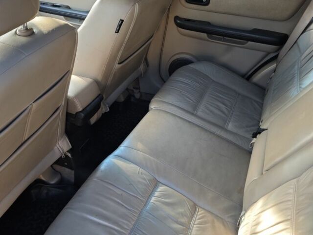 Серый Ниссан ИксТрейл, объемом двигателя 2 л и пробегом 320 тыс. км за 5500 $, фото 4 на Automoto.ua