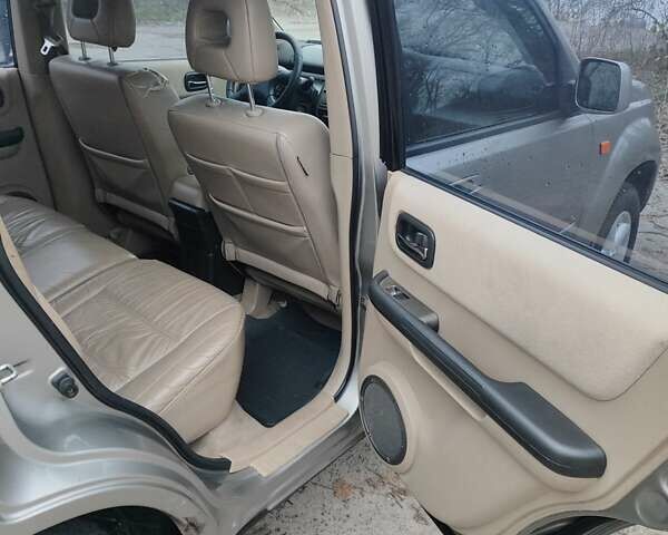 Сірий Ніссан ІксТрейл, об'ємом двигуна 2 л та пробігом 200 тис. км за 5900 $, фото 15 на Automoto.ua