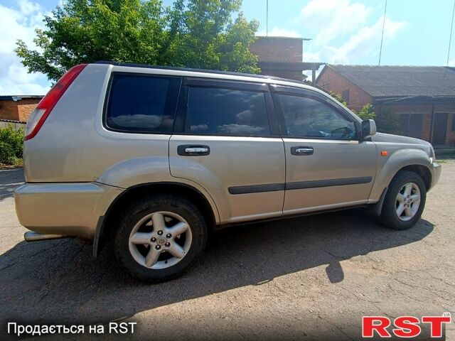 Серый Ниссан ИксТрейл, объемом двигателя 2 л и пробегом 275 тыс. км за 6300 $, фото 1 на Automoto.ua