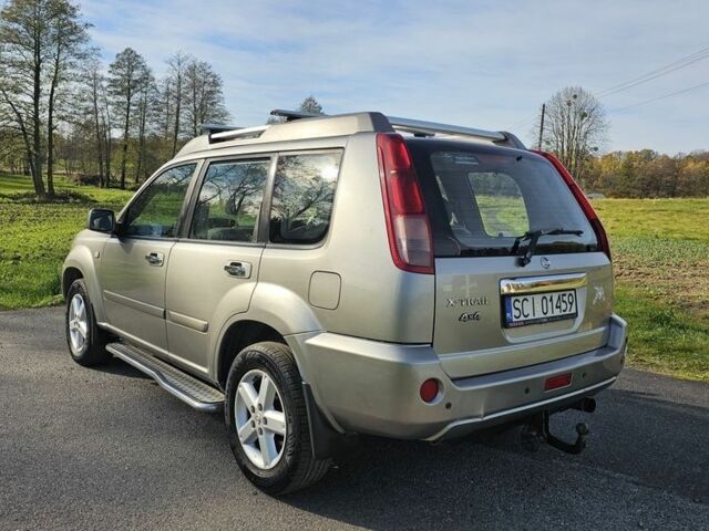 Серый Ниссан ИксТрейл, объемом двигателя 2 л и пробегом 223 тыс. км за 2200 $, фото 2 на Automoto.ua