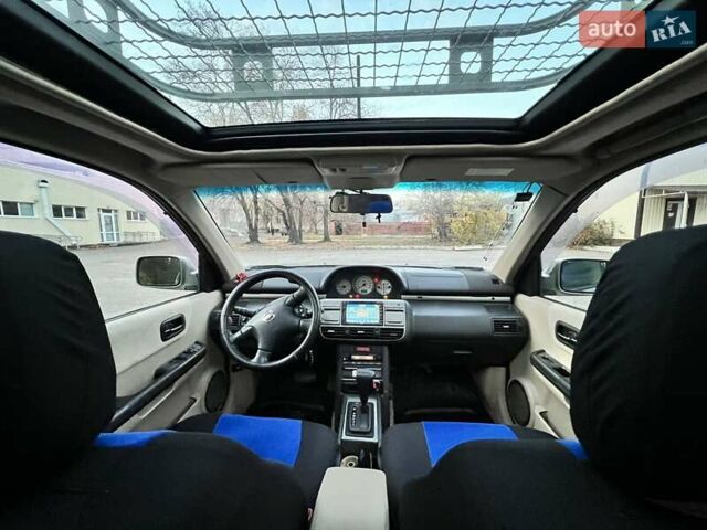 Сірий Ніссан ІксТрейл, об'ємом двигуна 2 л та пробігом 312 тис. км за 5300 $, фото 11 на Automoto.ua