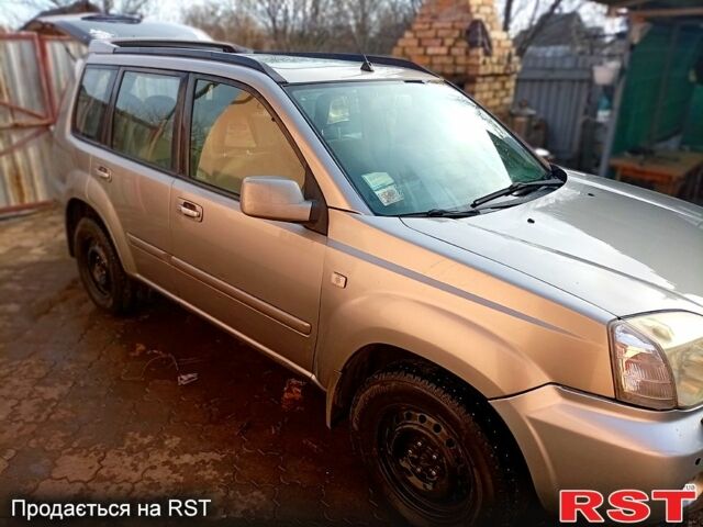 Сірий Ніссан ІксТрейл, об'ємом двигуна 2.5 л та пробігом 240 тис. км за 5800 $, фото 4 на Automoto.ua