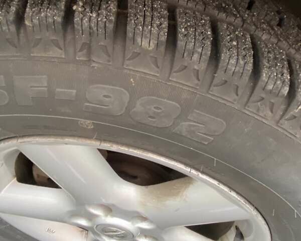 Сірий Ніссан ІксТрейл, об'ємом двигуна 2.5 л та пробігом 200 тис. км за 5400 $, фото 4 на Automoto.ua