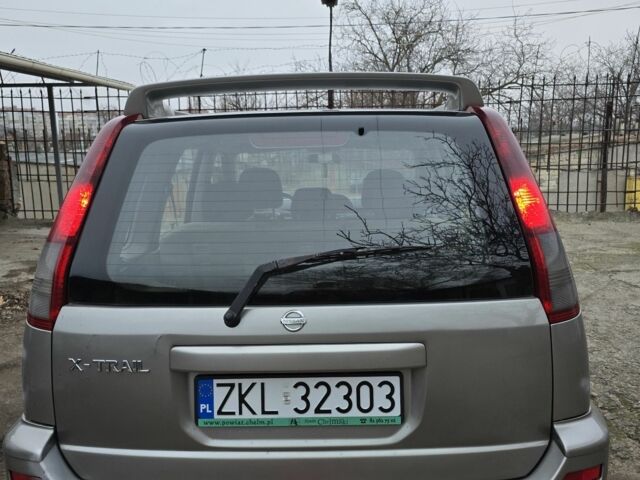 Сірий Ніссан ІксТрейл, об'ємом двигуна 2.2 л та пробігом 314 тис. км за 4500 $, фото 12 на Automoto.ua