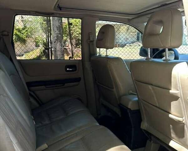 Серый Ниссан ИксТрейл, объемом двигателя 2.2 л и пробегом 281 тыс. км за 6500 $, фото 5 на Automoto.ua