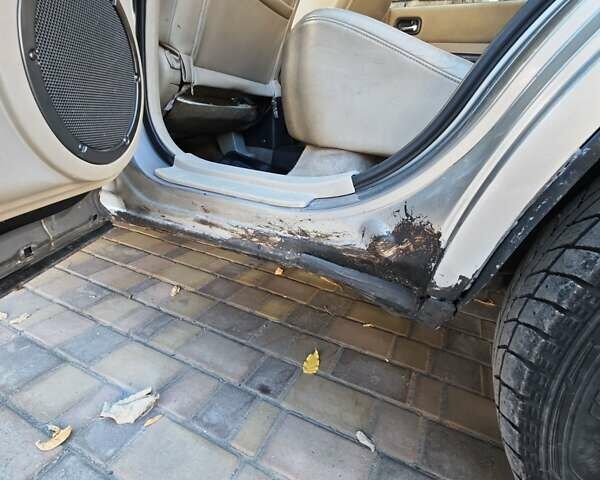 Сірий Ніссан ІксТрейл, об'ємом двигуна 2 л та пробігом 320 тис. км за 5500 $, фото 14 на Automoto.ua