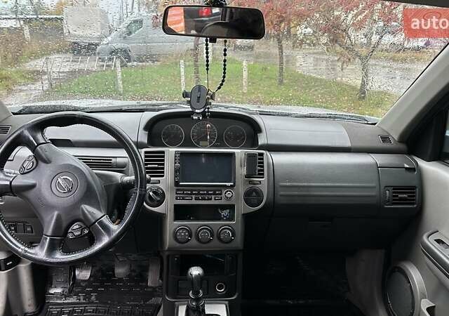 Серый Ниссан ИксТрейл, объемом двигателя 2.2 л и пробегом 391 тыс. км за 5000 $, фото 8 на Automoto.ua