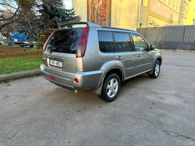 Серый Ниссан ИксТрейл, объемом двигателя 2.2 л и пробегом 319 тыс. км за 4000 $, фото 1 на Automoto.ua