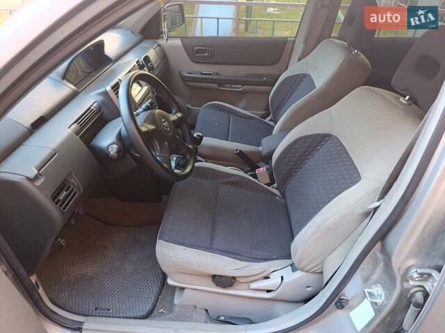 Серый Ниссан ИксТрейл, объемом двигателя 2.2 л и пробегом 345 тыс. км за 6800 $, фото 4 на Automoto.ua