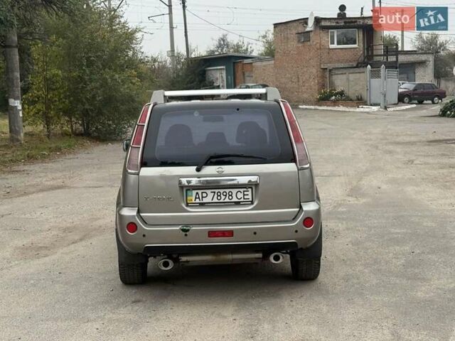 Серый Ниссан ИксТрейл, объемом двигателя 2.5 л и пробегом 265 тыс. км за 6000 $, фото 8 на Automoto.ua