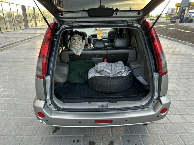 Серый Ниссан ИксТрейл, объемом двигателя 2 л и пробегом 160 тыс. км за 7000 $, фото 21 на Automoto.ua