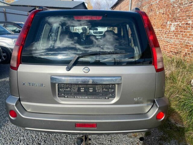 Сірий Ніссан ІксТрейл, об'ємом двигуна 2.2 л та пробігом 220 тис. км за 4100 $, фото 4 на Automoto.ua