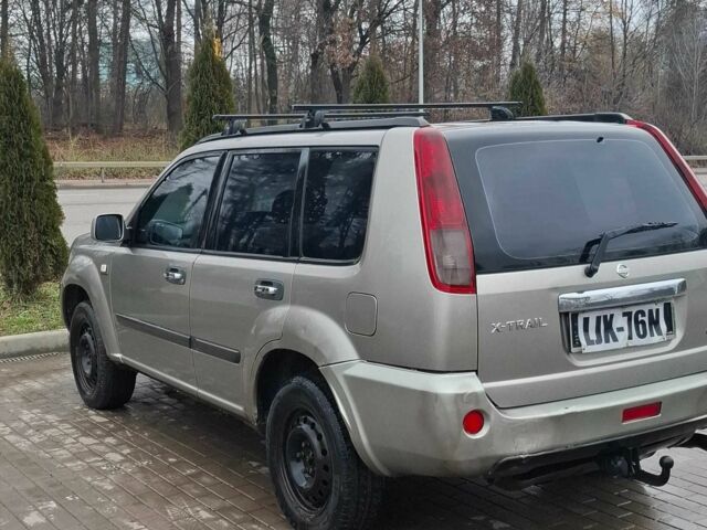 Серый Ниссан ИксТрейл, объемом двигателя 2.2 л и пробегом 327 тыс. км за 3077 $, фото 5 на Automoto.ua