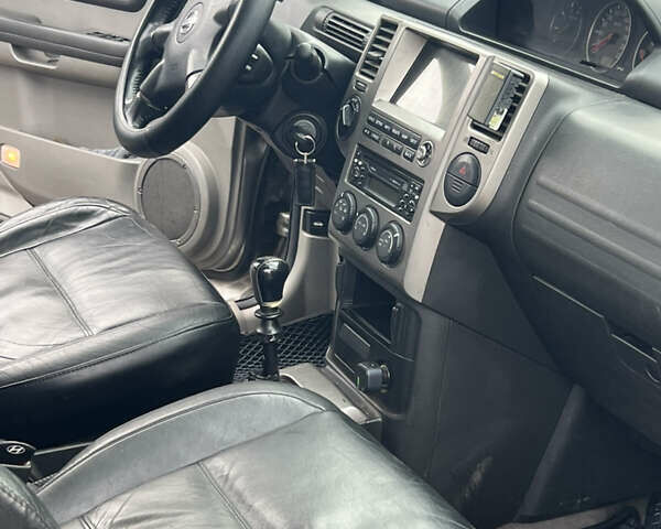 Сірий Ніссан ІксТрейл, об'ємом двигуна 2.2 л та пробігом 280 тис. км за 4100 $, фото 4 на Automoto.ua