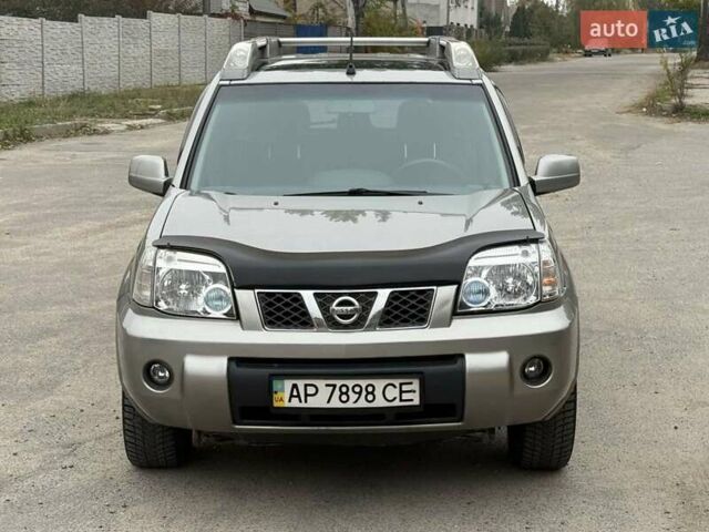 Серый Ниссан ИксТрейл, объемом двигателя 2.5 л и пробегом 265 тыс. км за 6000 $, фото 4 на Automoto.ua