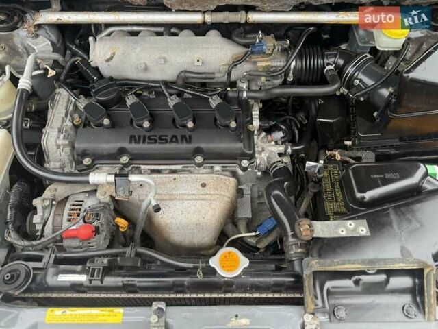 Серый Ниссан ИксТрейл, объемом двигателя 2.5 л и пробегом 265 тыс. км за 6000 $, фото 30 на Automoto.ua