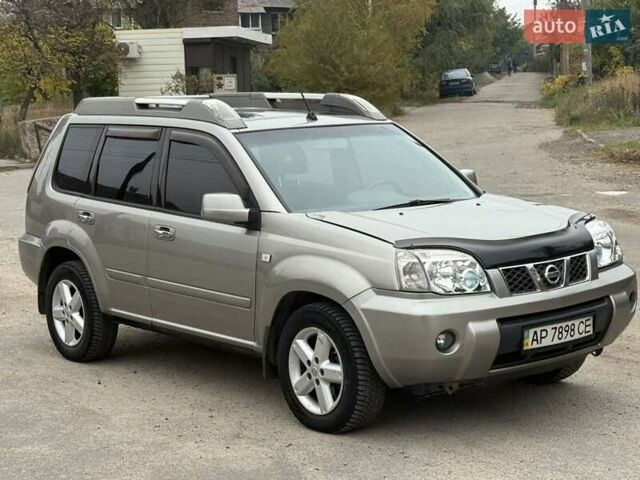 Серый Ниссан ИксТрейл, объемом двигателя 2.5 л и пробегом 265 тыс. км за 6000 $, фото 6 на Automoto.ua