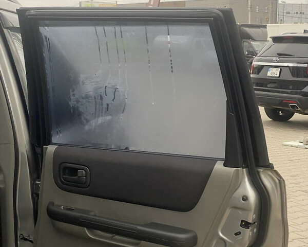 Серый Ниссан ИксТрейл, объемом двигателя 2 л и пробегом 246 тыс. км за 4499 $, фото 14 на Automoto.ua