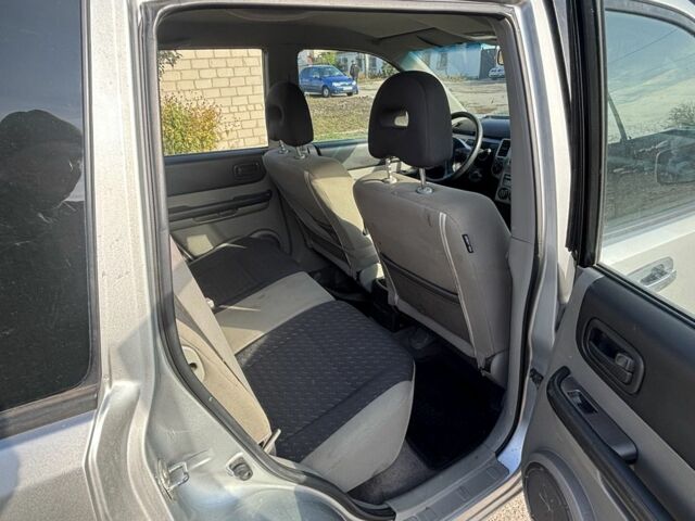 Сірий Ніссан ІксТрейл, об'ємом двигуна 2.2 л та пробігом 343 тис. км за 3900 $, фото 6 на Automoto.ua