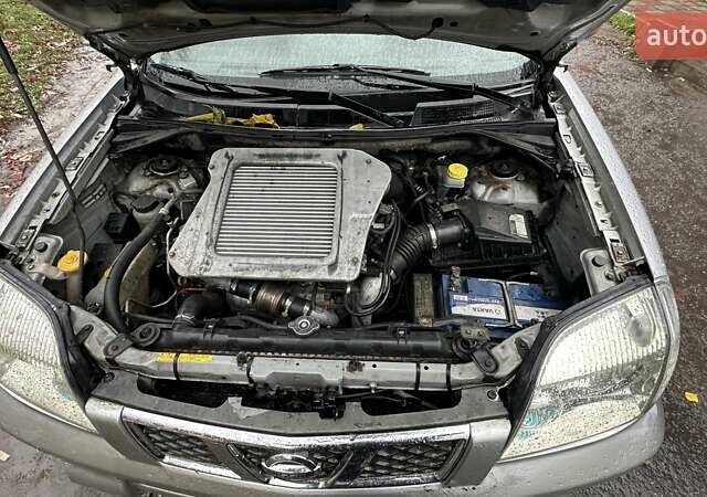 Серый Ниссан ИксТрейл, объемом двигателя 2.2 л и пробегом 391 тыс. км за 5000 $, фото 7 на Automoto.ua