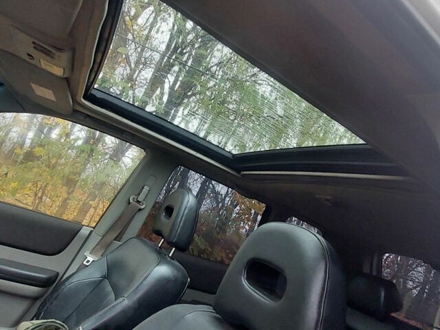 Серый Ниссан ИксТрейл, объемом двигателя 2 л и пробегом 450 тыс. км за 4042 $, фото 3 на Automoto.ua