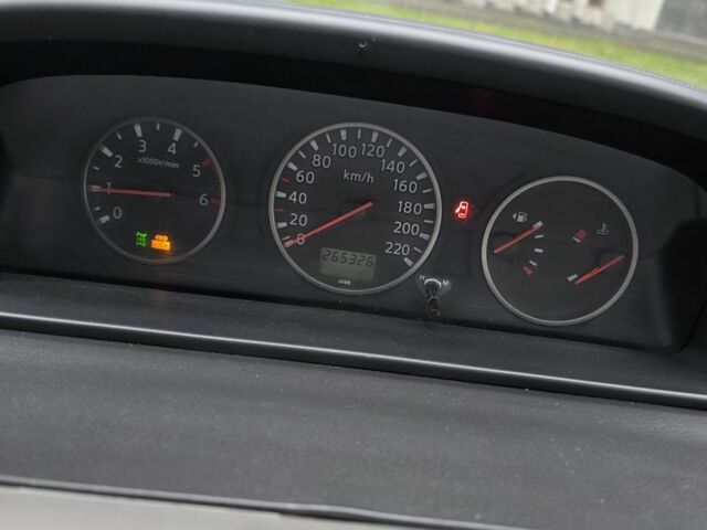 Серый Ниссан ИксТрейл, объемом двигателя 2.2 л и пробегом 260 тыс. км за 4199 $, фото 19 на Automoto.ua