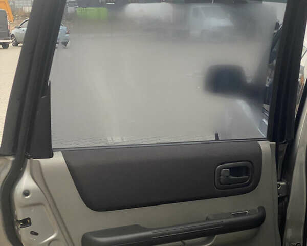 Серый Ниссан ИксТрейл, объемом двигателя 2 л и пробегом 246 тыс. км за 4499 $, фото 16 на Automoto.ua