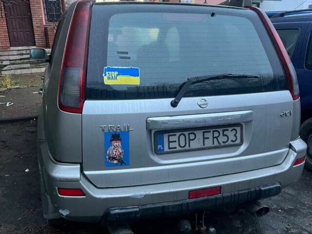 Сірий Ніссан ІксТрейл, об'ємом двигуна 2.2 л та пробігом 300 тис. км за 3799 $, фото 2 на Automoto.ua