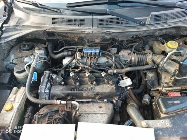 Серый Ниссан ИксТрейл, объемом двигателя 2 л и пробегом 242 тыс. км за 4300 $, фото 6 на Automoto.ua