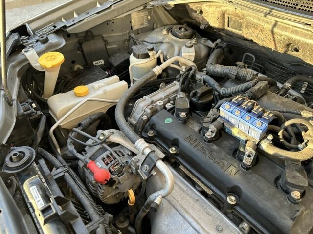 Серый Ниссан ИксТрейл, объемом двигателя 2 л и пробегом 160 тыс. км за 7000 $, фото 7 на Automoto.ua