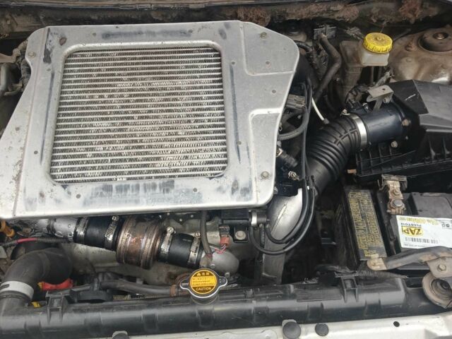 Серый Ниссан ИксТрейл, объемом двигателя 2.2 л и пробегом 260 тыс. км за 4300 $, фото 6 на Automoto.ua