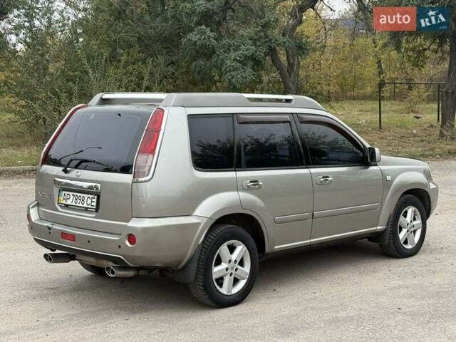 Серый Ниссан ИксТрейл, объемом двигателя 2.5 л и пробегом 265 тыс. км за 6000 $, фото 7 на Automoto.ua