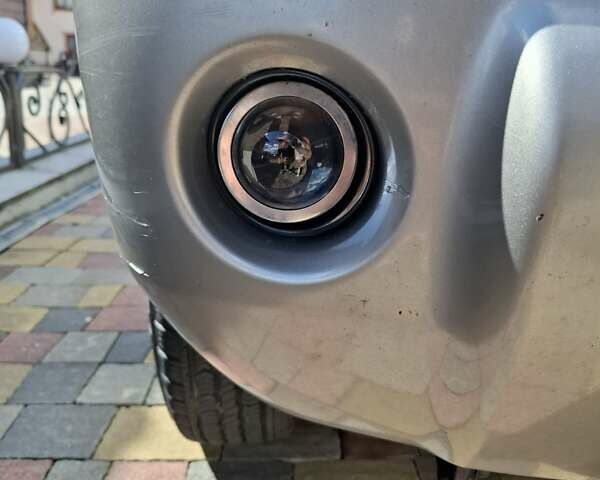 Серый Ниссан ИксТрейл, объемом двигателя 2 л и пробегом 270 тыс. км за 8599 $, фото 3 на Automoto.ua