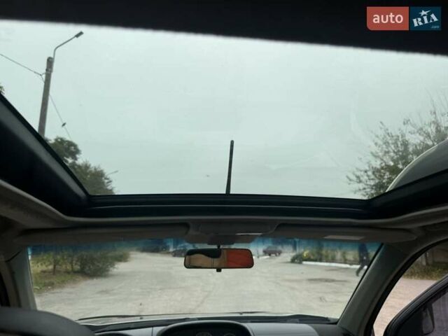 Серый Ниссан ИксТрейл, объемом двигателя 2.5 л и пробегом 265 тыс. км за 6000 $, фото 17 на Automoto.ua