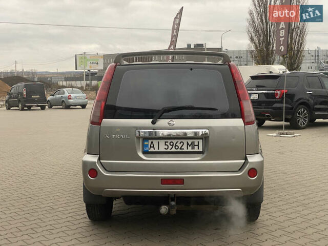 Серый Ниссан ИксТрейл, объемом двигателя 2 л и пробегом 246 тыс. км за 4499 $, фото 6 на Automoto.ua