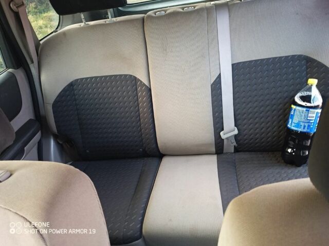 Серый Ниссан ИксТрейл, объемом двигателя 2 л и пробегом 242 тыс. км за 4300 $, фото 4 на Automoto.ua